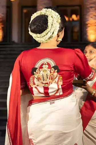 White lychee silk saree with red motifs & border