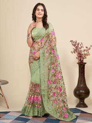 Mint saree with embroidered borders & pink floral patches 1