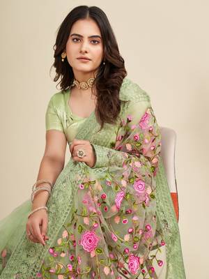 Mint saree with embroidered borders & pink floral patches 3