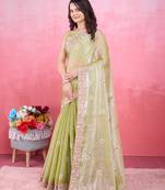 Mehendi green poly silk saree with embroidered borders