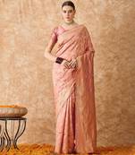 Peach art silk saree with all-over gold zari motifs