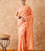 Peach saree with light motifs & zari border