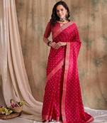Rani pink woven art silk saree with zari polka dots