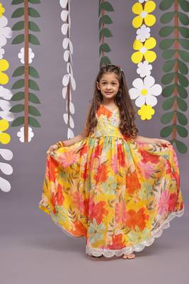 Intricate embroidery and floral printed organza anarkali in yellow 1