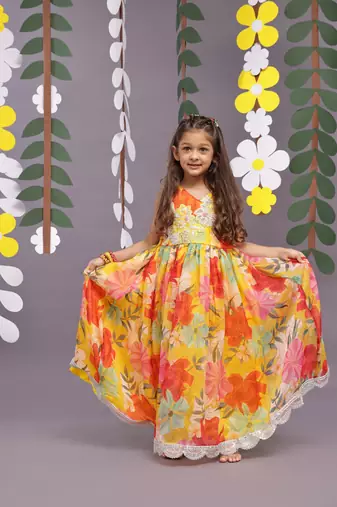 Intricate embroidery and floral printed organza anarkali in yellow