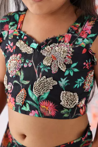 Black floral printed lehenga and sequence embroidered top