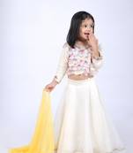 Off white top and organza lehenga with yellow dupatta