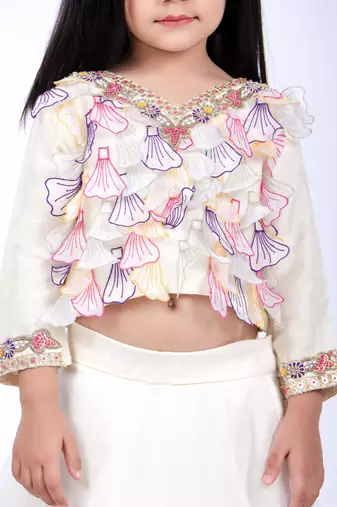 Off white top and organza lehenga with yellow dupatta