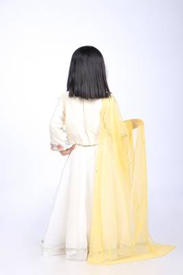Off white top and organza lehenga with yellow dupatta 5