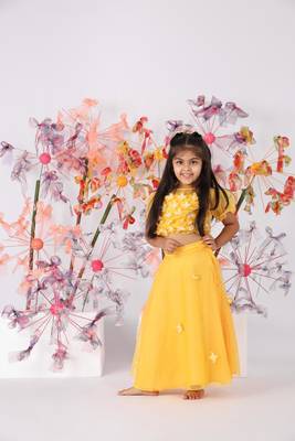 Yellow organza top with puffed sleeves and organza lehenga 1