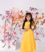 Yellow organza top with puffed sleeves and organza lehenga