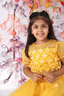 Yellow organza top with puffed sleeves and organza lehenga 3