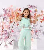 Dark mint sleeveless organza top with pastel floral embroidery and silk pants