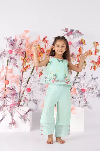 Dark mint sleeveless organza top with pastel floral embroidery and silk pants