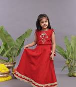Gold work embroidered silk lehenga and blouse in red