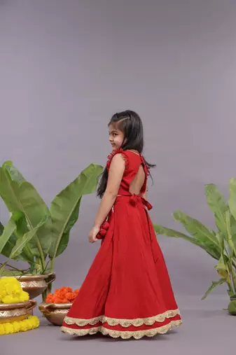 Gold work embroidered silk lehenga and blouse in red