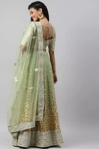 green zari worked soft net lehenga set choli with dupatta