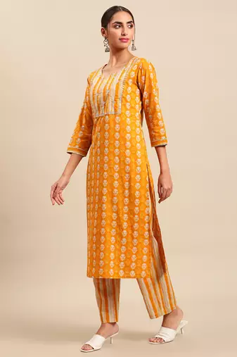 Yellow printed cotton round neck kurta sets