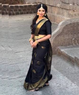 Black saree with gold zari polka dots 1