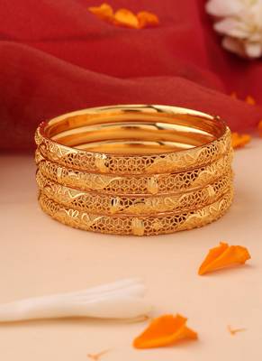 Set of 4 gold bangles with cutwork engraving 1
