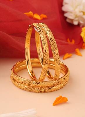 Set of 4 gold bangles with cutwork engraving 2