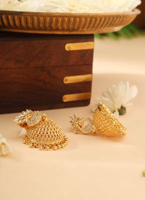 Gold jhumkas with american diamond accent 3
