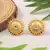 Gold Circular Studs with Sun-Inspired Motifs