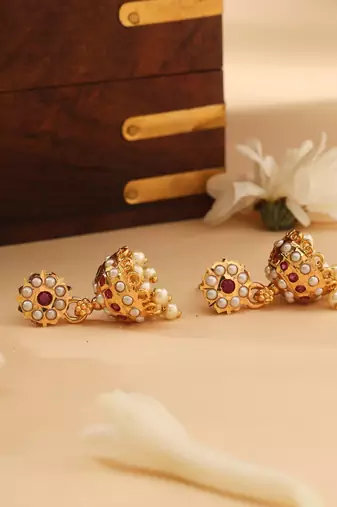 Gold Jhumkas with Pink and White Stone Accents