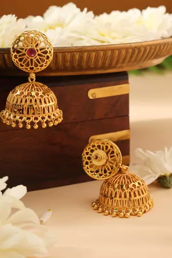 Gold Jhumkas with Pink Stone Accent