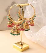 Gold hoops with jhumka detailing and green bead accents