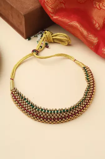 High Gold Necklace Set with Pink Stones and Matching Jhumkas