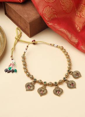 High Gold Necklace with Gold Motifs, Matching Earrings, and Stone Accents 1