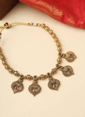High Gold Necklace with Gold Motifs, Matching Earrings, and Stone Accents 2