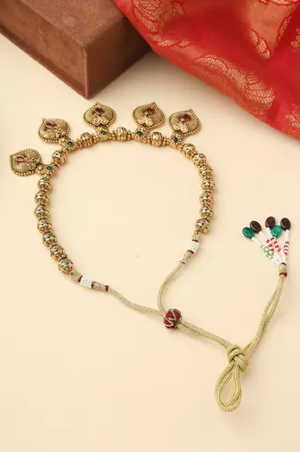 High Gold Necklace with Gold Motifs, Matching Earrings, and Stone Accents