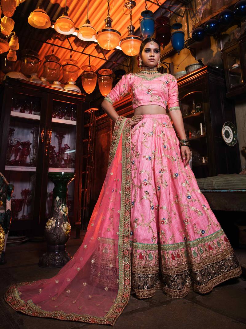 Charismatic Pink Colored Bridal Wear Embroidered Lehenga Choli