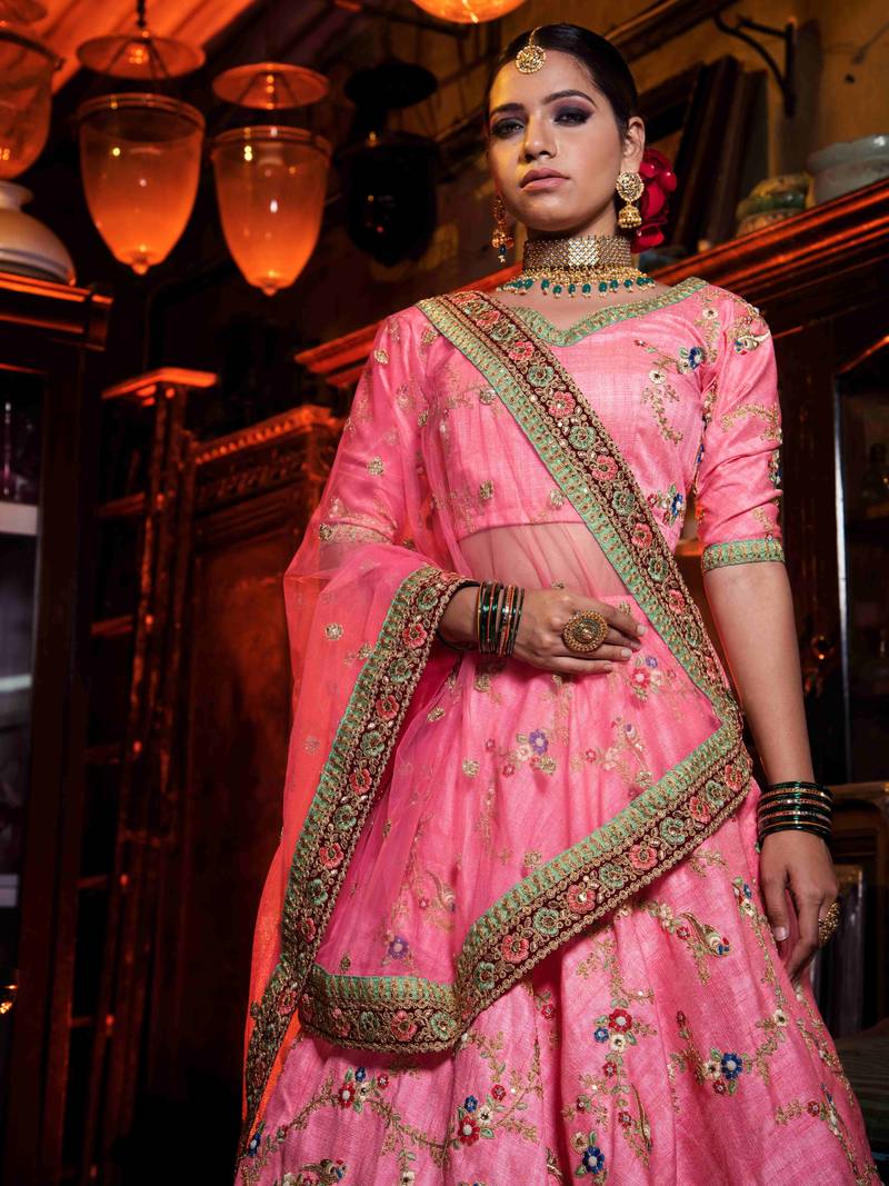 Charismatic Pink Colored Bridal Wear Embroidered Lehenga Choli
