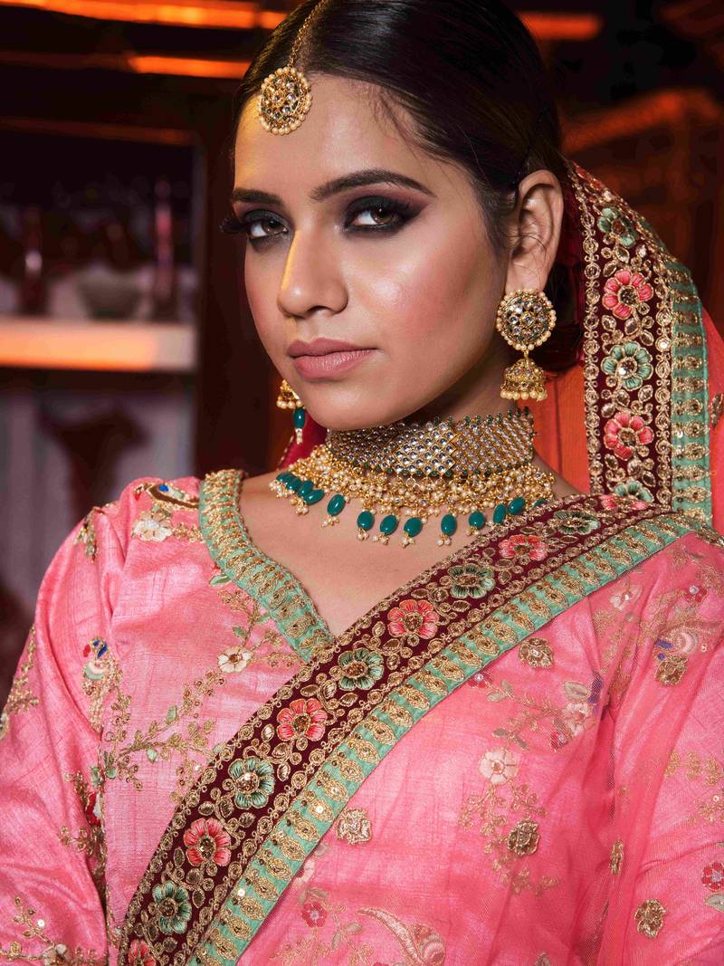 Charismatic Pink Colored Bridal Wear Embroidered Lehenga Choli