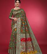 green woven cotton silk blend saree with blouse piece