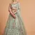 pista green thread embroidery net lehenga-choli