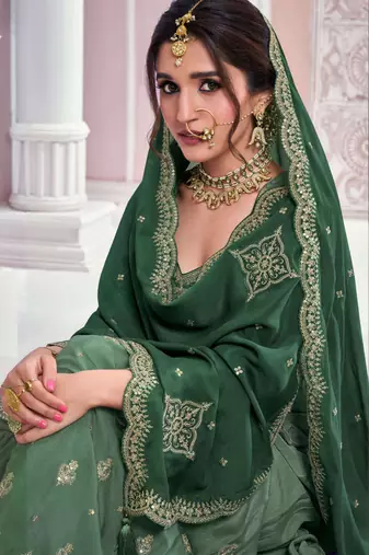 Green embroidered chinon free size stitched sharara suit