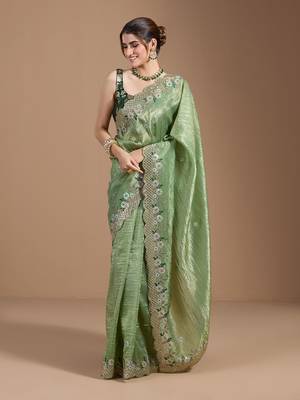Green gold crush embroidery & sequence work with all over butta and amazing arc cutting 1