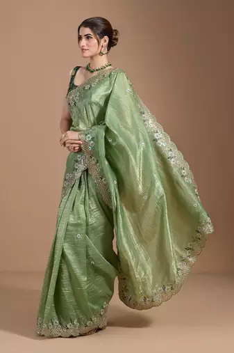 Green gold crush embroidery & sequence work with all over butta and amazing arc cutting