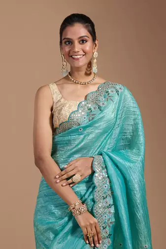 Teal gold crush embroidery & sequence work with all over butta and amazing arc cutting