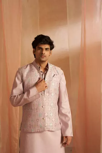 Purple ethnic indian wedding wear kurta payjama with nehru jacket for classy looks