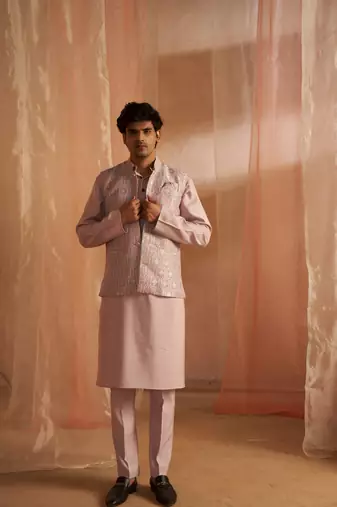 Purple ethnic indian wedding wear kurta payjama with nehru jacket for classy looks