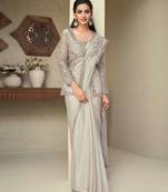 light beige embroidery simy silk designer saree with unstitched jacket for wedding party