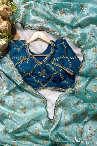 Teal pure soft zimmi choo fabric sarees with beautiful embroidery work with stiched blouse