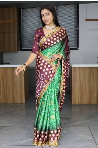 Green  patola print satin saree with unstished blouse