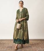 The bottle green silk tissue chanderi kalidaar ensemble