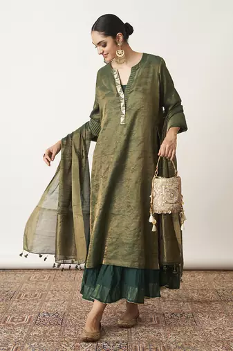 The bottle green silk tissue chanderi kalidaar ensemble